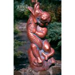 Chłopiec na rybie mały